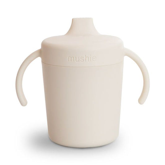 https://www.vanastenbabysuperstore.nl/media/catalog/product/8/2/8292800215_1_training_mushie_sippy_cup_ivory.jpg