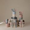 https://www.vanastenbabysuperstore.nl/media/catalog/product/8/2/8292800270_2_bestekset_mushie_sage.jpg