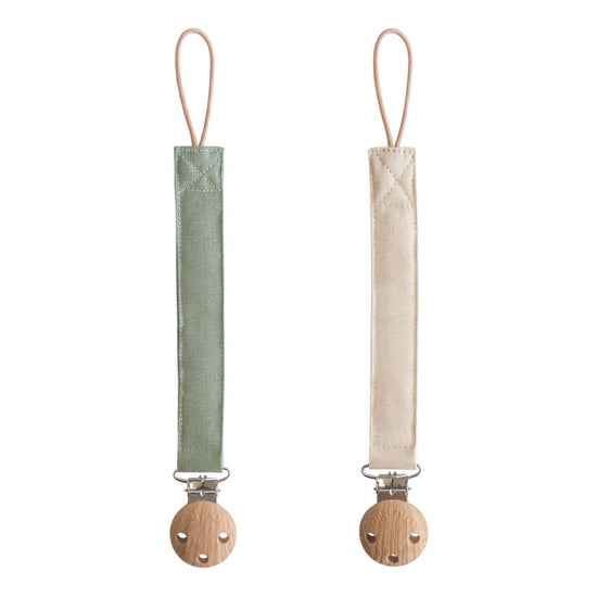 https://www.vanastenbabysuperstore.nl/media/catalog/product/8/2/8292820008_1_speenketting_mushie_linnen_olivesand.jpg