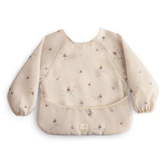 https://www.vanastenbabysuperstore.nl/media/catalog/product/8/2/8292870001_1_slabber_mushie_long_sleeve_boats.jpg