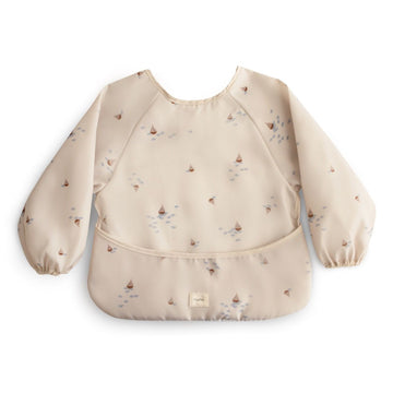 https://www.vanastenbabysuperstore.nl/media/catalog/product/8/2/8292870001_1_slabber_mushie_long_sleeve_boats.jpg