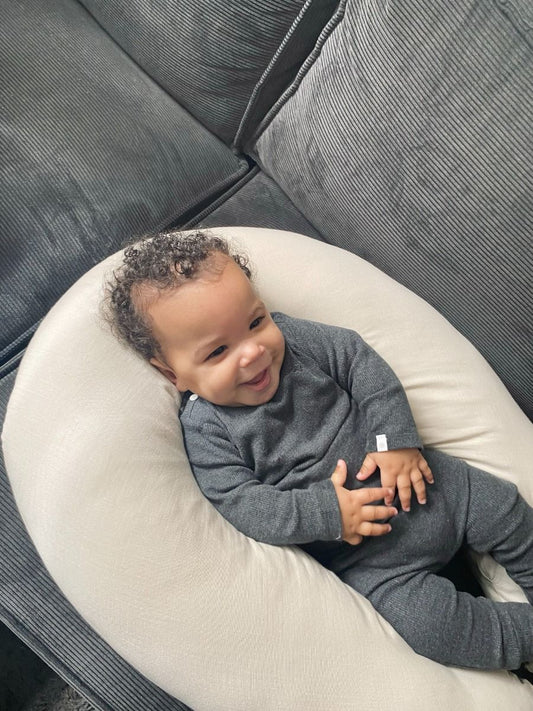 https://www.vanastenbabysuperstore.nl/media/catalog/product/8/4/8461750001_2_voedingskussen_zwangerschapskussen_funnababy_muslin_sand.jpg