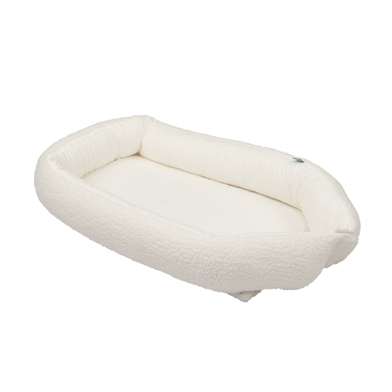 https://www.vanastenbabysuperstore.nl/media/catalog/product/8/4/8462100009_1_babynest_funnababy_teddy_off_white.png