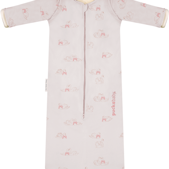 https://www.vanastenbabysuperstore.nl/media/catalog/product/9/3/9352150133_1_slaapzak_puckababy_bag_4_seasons_swans_2.png