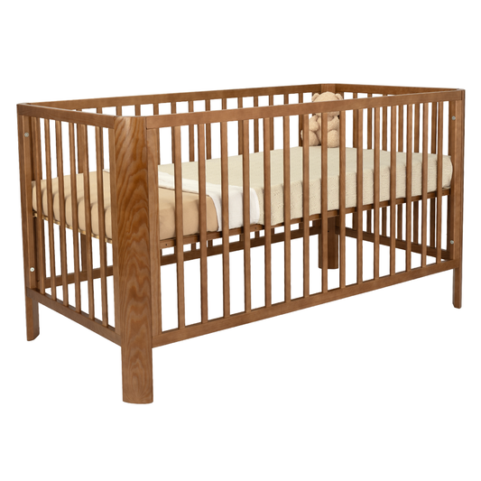 https://www.vanastenbabysuperstore.nl/media/catalog/product/9/5/9510010036_2_meegroeiledikant_novi_at_home_florine_70x140_walnut_ronde_1768324004.png