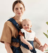 BabyBjörn Babyslabbetje tot Voetenzak Harmony - Wit - BabyBjörn - OneSize - Kwijlsjaaltjes
