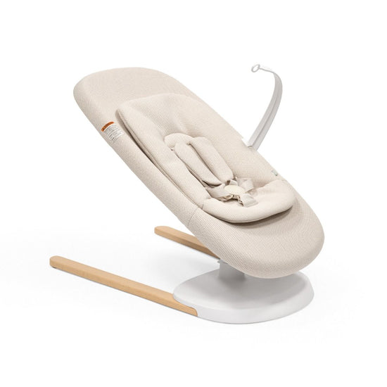 https://www.vanastenbabysuperstore.nl/media/catalog/product/s/t/stokkeyoga_bouncer_lightsand_low_inlay_toyhanger_us_240923-8287.jpg
