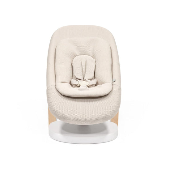 https://www.vanastenbabysuperstore.nl/media/catalog/product/s/t/stokkeyoga_bouncer_lightsand_middle_inlay_front_240923-8308.jpg